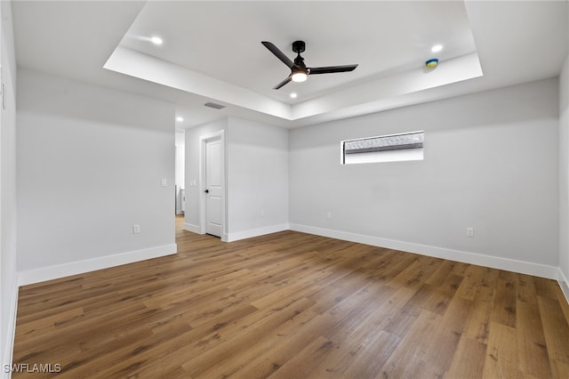 2706 39th St W, Lehigh Acres, FL 33971 - empty room featuring a raised ceiling, ceiling fan, visible vents, baseboards, and recessed lighting