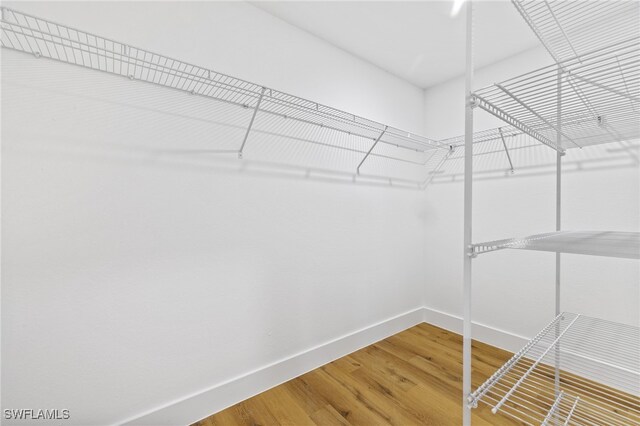 2706 39th St W, Lehigh Acres, FL 33971 - spacious closet featuring light wood-style flooring