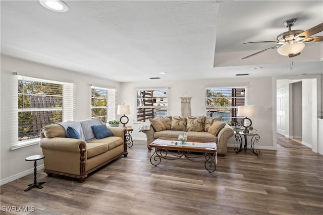 living area featuring baseboards, plenty of natural light, recessed lighting, and ceiling fan