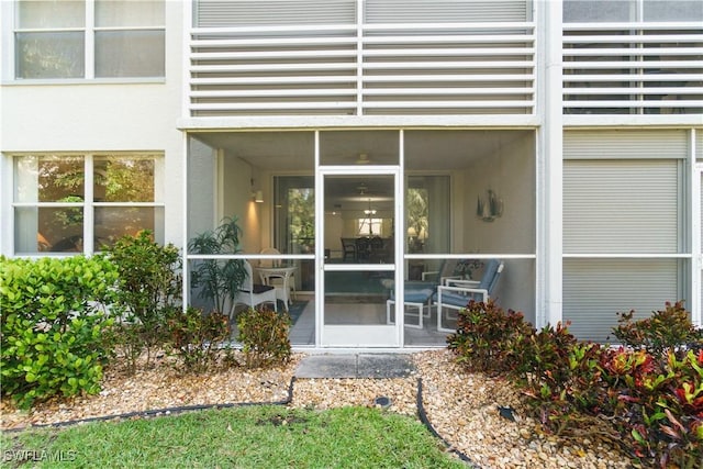 290 Naples Cove Dr Unit 2103, Naples, FL 34110 - doorway to property with stucco siding