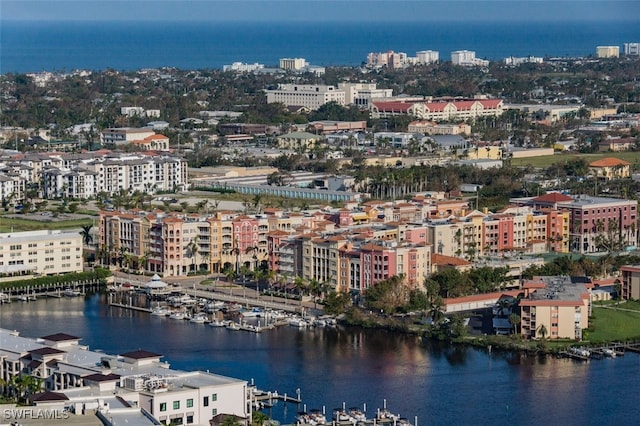 aerial view featuring a view of city and a water view