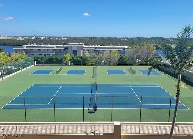view of sport court featuring fence and community basketball court