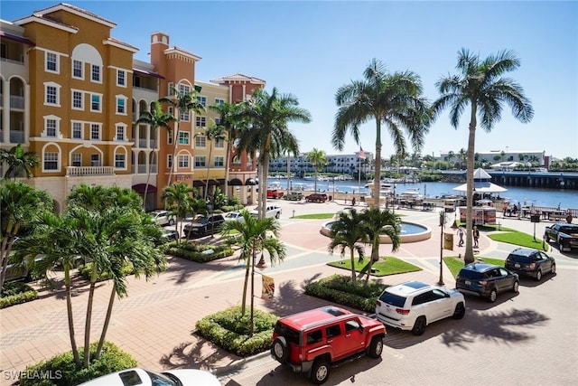 view of community with a water view