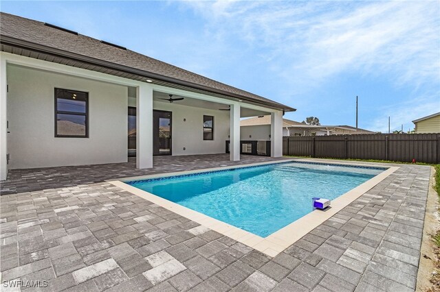 806 Santa Barbara Blvd, Cape Coral, FL 33991 - view of pool with fence, ceiling fan, a fenced in pool, and a patio area