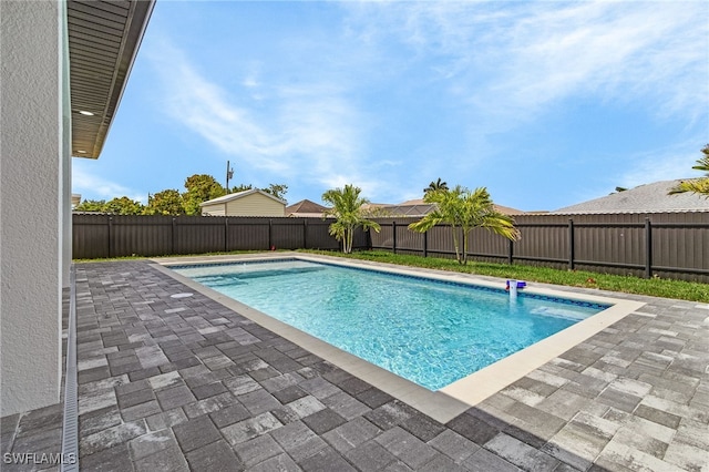 806 Santa Barbara Blvd, Cape Coral, FL 33991 - view of swimming pool featuring a patio, a fenced in pool, and a fenced backyard