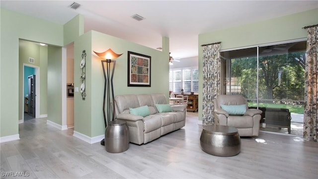 761 Grand Rapids Blvd, Naples, FL 34120 - living area featuring wood finished floors, ceiling fan, and baseboards