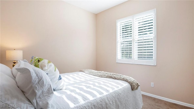 761 Grand Rapids Blvd, Naples, FL 34120 - carpeted bedroom with baseboards