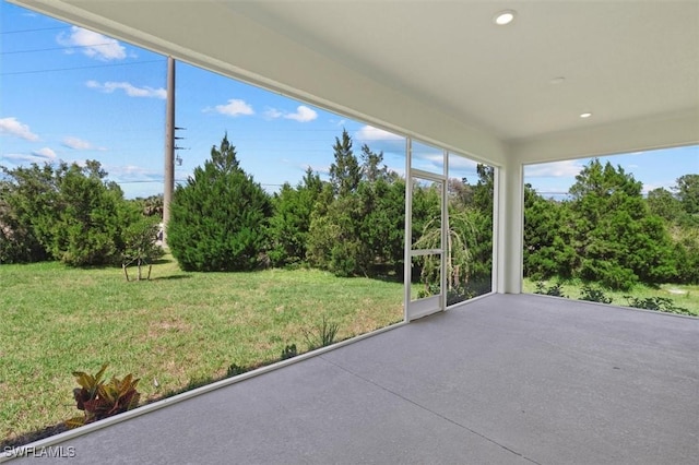 unfurnished sunroom with recessed lighting