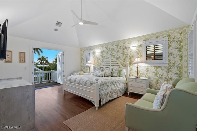 bedroom with visible vents, wood finished floors, high vaulted ceiling, access to outside, and wallpapered walls