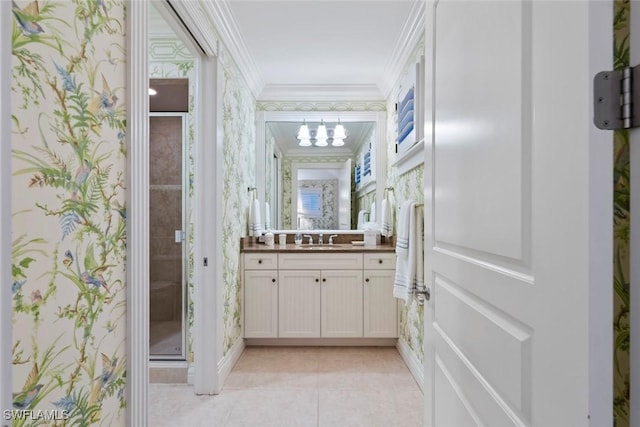 bathroom with vanity, ornamental molding, a stall shower, and tile patterned flooring