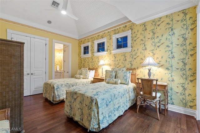 bedroom with wallpapered walls, baseboards, lofted ceiling, visible vents, and dark wood-style floors