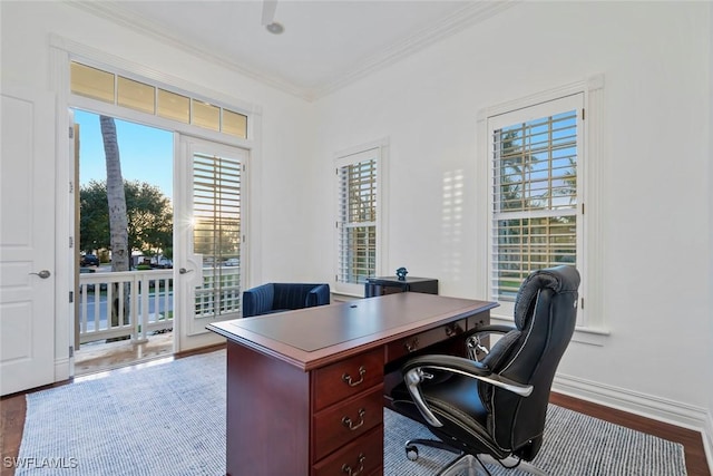 office featuring crown molding, baseboards, and wood finished floors