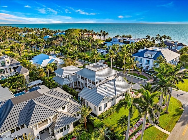 birds eye view of property featuring a residential view and a water view