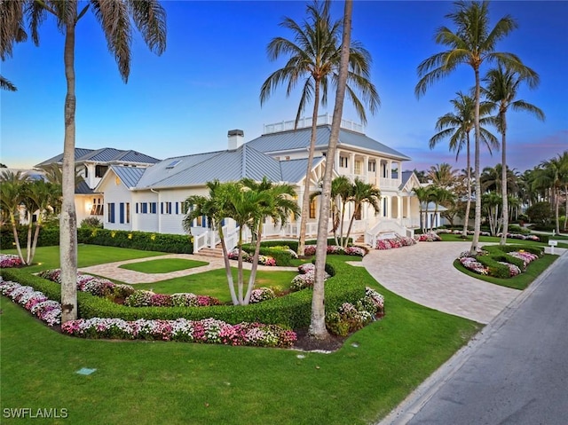 view of building exterior featuring curved driveway