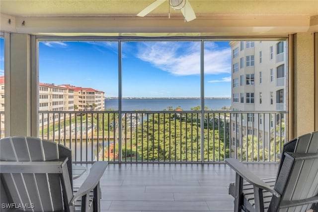 15140 Harbour Isle Dr Unit 502, Fort Myers, FL 33908 - sunroom / solarium featuring a water view and healthy amount of natural light