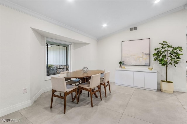 dining area featuring recessed lighting, visible vents, baseboards, ornamental molding, and lofted ceiling
