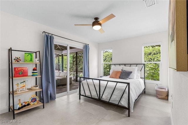 bedroom with access to exterior, visible vents, ceiling fan, and tile patterned floors