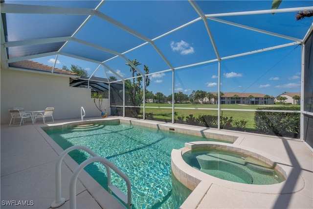 8789 Cedar Hammock Blvd Unit 61, Naples, FL 34112 - view of swimming pool with a patio area, a pool with connected hot tub, and glass enclosure