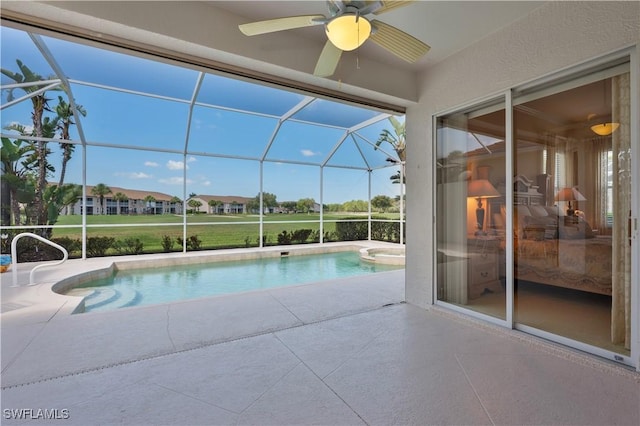 8789 Cedar Hammock Blvd Unit 61, Naples, FL 34112 - view of pool with a patio area, a ceiling fan, a pool with connected hot tub, and glass enclosure