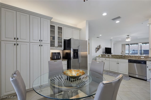 6537 Monterey Pt Unit 202, Naples, FL 34105 - dining area featuring a ceiling fan, recessed lighting, and light tile patterned floors