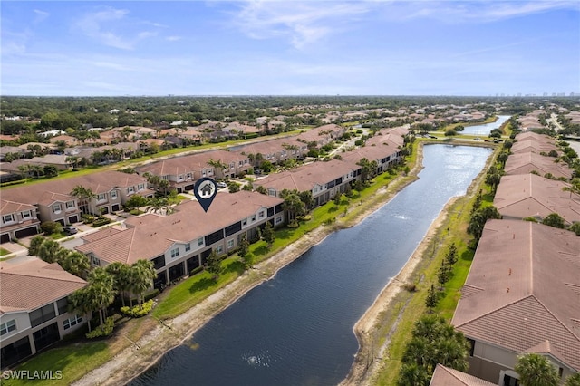 bird's eye view with a residential view and a water view