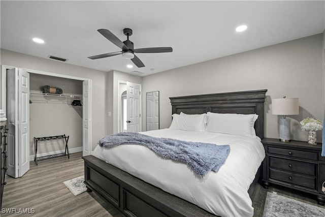 828 SW 51st Ter, Cape Coral, FL 33914 - bedroom with recessed lighting, visible vents, ceiling fan, and wood finished floors