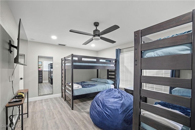 828 SW 51st Ter, Cape Coral, FL 33914 - bedroom with visible vents, baseboards, recessed lighting, wood finished floors, and a ceiling fan