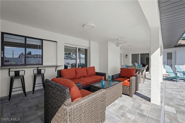 828 SW 51st Ter, Cape Coral, FL 33914 - view of patio / terrace featuring outdoor lounge area, outdoor dining space, a ceiling fan, and outdoor dry bar