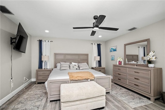 828 SW 51st Ter, Cape Coral, FL 33914 - bedroom with light wood finished floors, recessed lighting, and visible vents