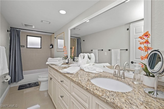 828 SW 51st Ter, Cape Coral, FL 33914 - full bathroom featuring tile patterned floors, visible vents, toilet, and a sink