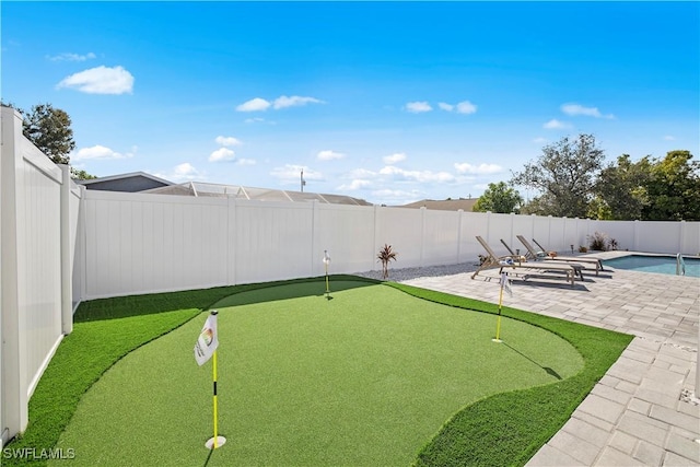 828 SW 51st Ter, Cape Coral, FL 33914 - view of property's community with a fenced backyard and a patio area