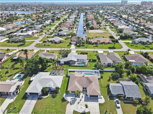 828 SW 51st Ter, Cape Coral, FL 33914 - drone / aerial view featuring a residential view and a water view