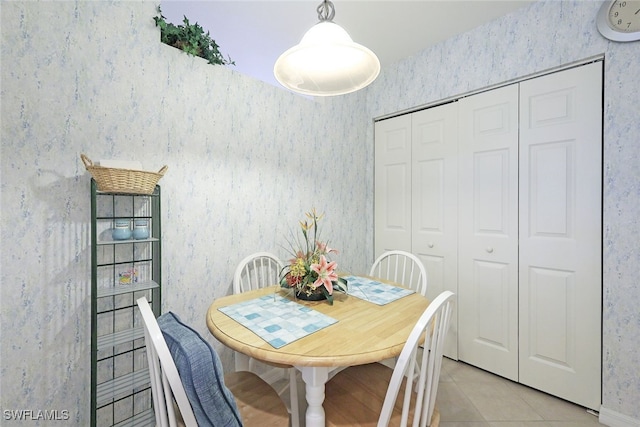 8355 Whisper Trace Way Unit K-103, Naples, FL 34114 - dining room with wallpapered walls and light tile patterned flooring