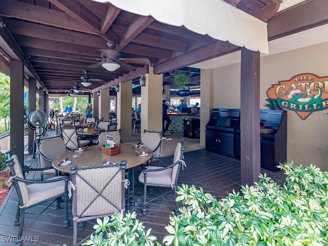 8355 Whisper Trace Way Unit K-103, Naples, FL 34114 - view of patio / terrace with outdoor dining space and ceiling fan