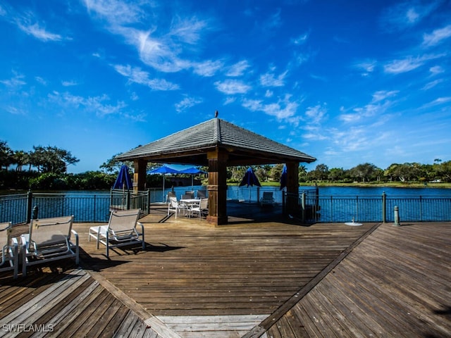 8355 Whisper Trace Way Unit K-103, Naples, FL 34114 - dock area featuring a gazebo and a deck with water view