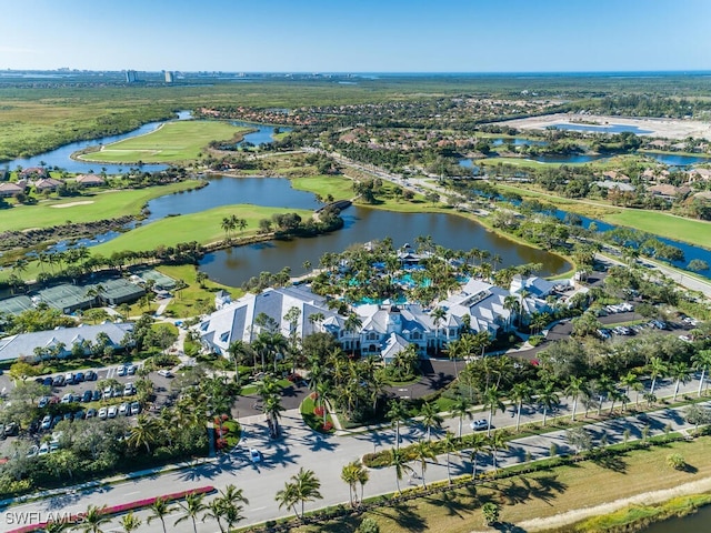 8355 Whisper Trace Way Unit K-103, Naples, FL 34114 - birds eye view of property with golf course view, a residential view, and a water view