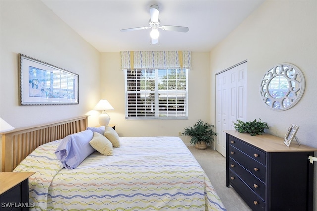 8355 Whisper Trace Way Unit K-103, Naples, FL 34114 - bedroom featuring ceiling fan, light carpet, and a closet
