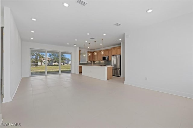 unfurnished living room with baseboards, recessed lighting, and visible vents