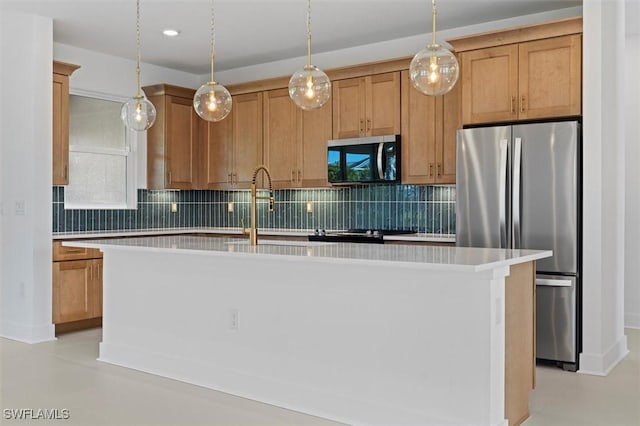 kitchen with tasteful backsplash, stainless steel appliances, a kitchen island with sink, and light countertops
