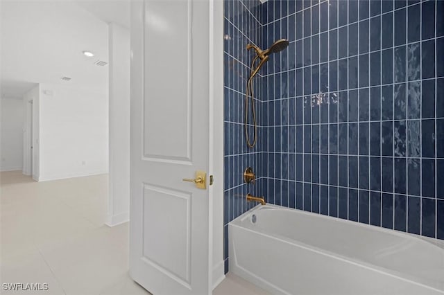 bathroom featuring shower / bathing tub combination and tile patterned flooring