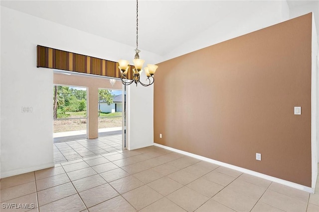 unfurnished room featuring light tile patterned flooring, a chandelier, vaulted ceiling, and baseboards