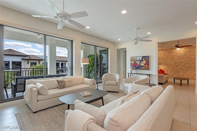 living room with recessed lighting, a ceiling fan, and light tile patterned flooring