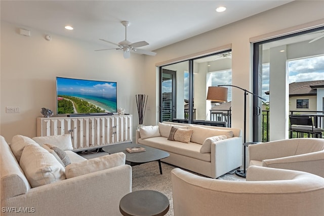 living area with recessed lighting and ceiling fan