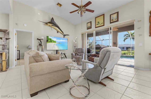 1103 SW 8th Ct, Cape Coral, FL 33991 - living room with a ceiling fan, high vaulted ceiling, and a healthy amount of sunlight