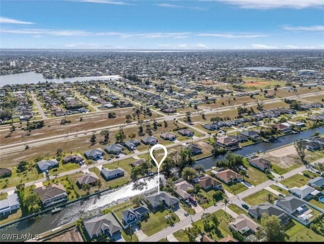 1103 SW 8th Ct, Cape Coral, FL 33991 - birds eye view of property with a residential view and a water view