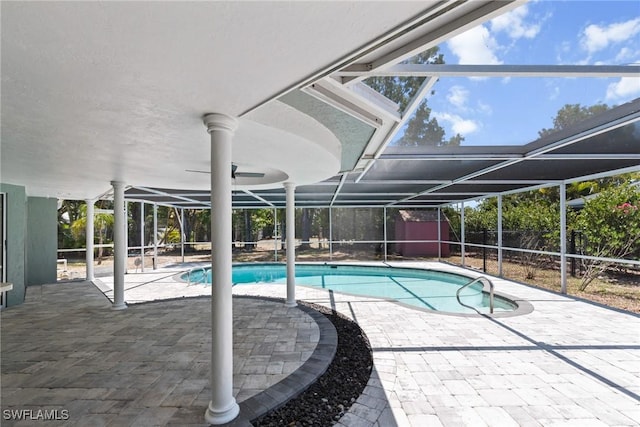 view of swimming pool with a patio, a fenced in pool, and a lanai