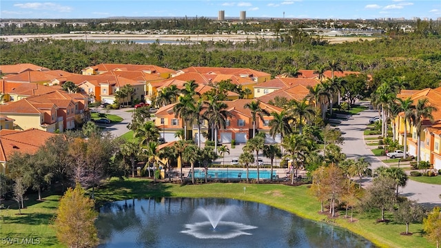 aerial view featuring a residential view and a water view