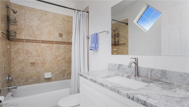 bathroom with toilet, shower / bath combo, and vanity