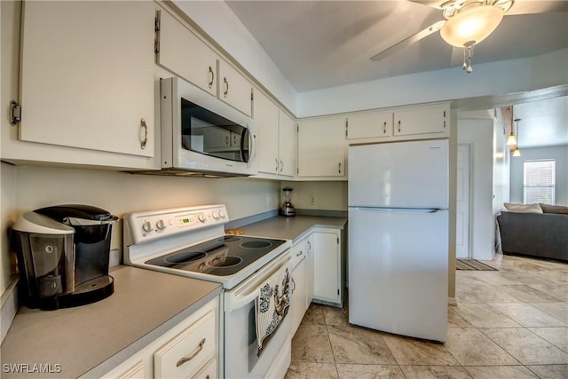 kitchen with white appliances, ceiling fan, light countertops, and white cabinets