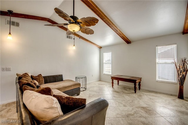 living room with ceiling fan and baseboards